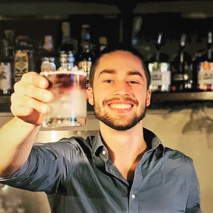 raising a glass at Mainland Whisky
